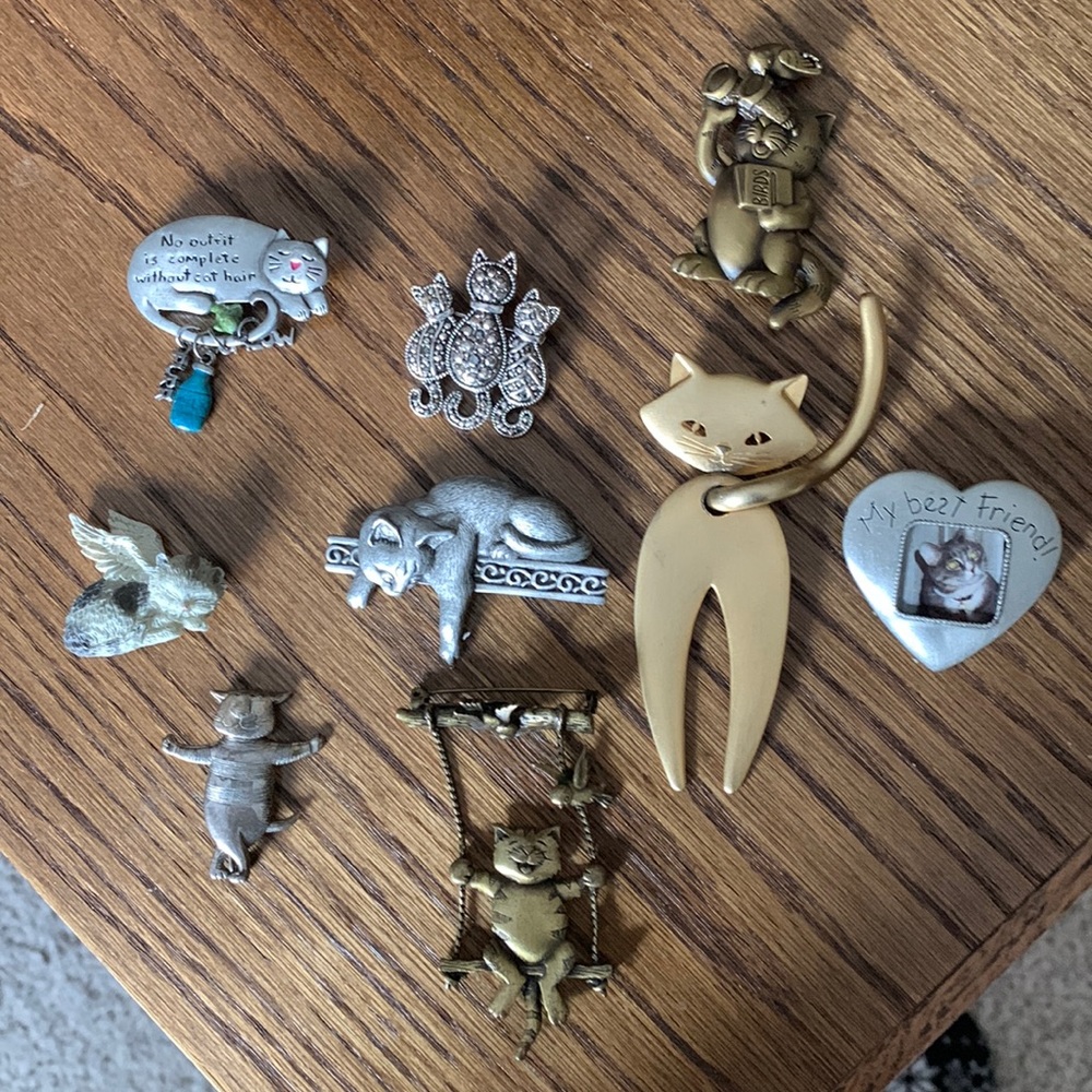 Pins for the cat lover. 9 pins in all by JJ,  TC& ?